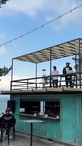 Shipping container bar with DJ setup in Tsamakaberd, Armenia
