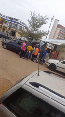 Morning street activity and transport services in Dadi Riba, Nigeria