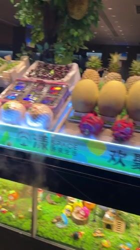Woman gives Thai greeting at tropical fruit display in Pudong