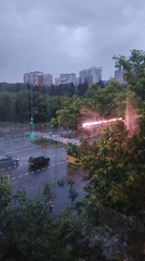 Rainy day life documented across Izhevsk during evening hours