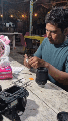 Camera repair session documented in Lhokseumawe workshop