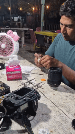 Camera repair session documented in Lhokseumawe workshop