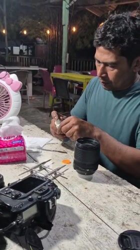Camera repair session documented in Lhokseumawe workshop