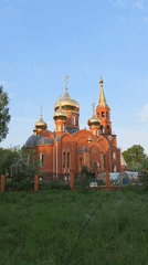 Evening scenes captured around church and residential areas in Chaikovsky