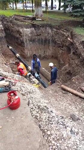 Underground pipe work in progress at an active excavation site