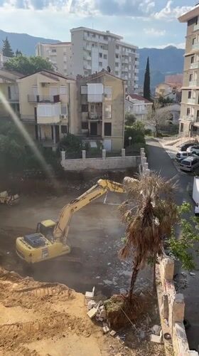 Excavator conducts digging operations in Montenegro pit
