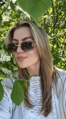 Woman enjoys spring blooms in urban setting