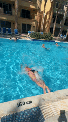 Woman photographed at Egyptian resort poolside Saturday morning