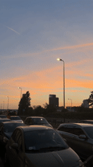 Milan sunset captured across streets and Navigli canals