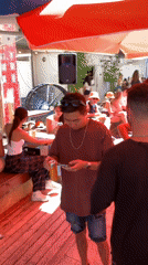 Daytime social gatherings documented at Tel-Aviv outdoor cafés