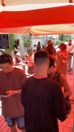 Daytime social gatherings documented at Tel-Aviv outdoor cafés