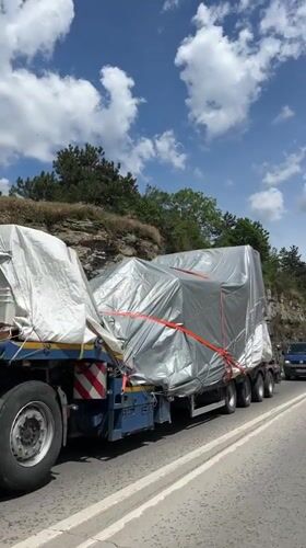 Semi-truck transports covered cargo near Veliko Tarnovo, Bulgaria