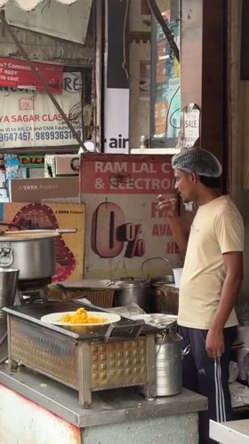 Morning street life documented across Delhi commercial districts