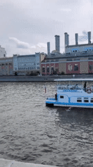 Summer afternoon activity captured along Moscow River near Zaryadye Park