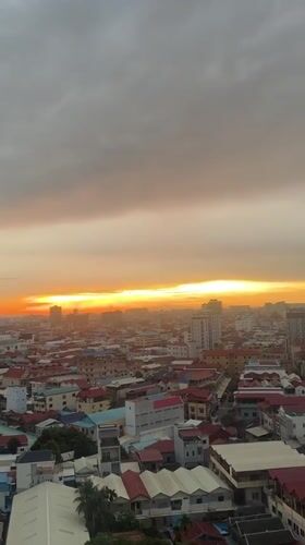 Sunset aerials and construction activity over Khan Mean Chey