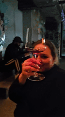 Couple spotted at Moscow bar with Russian wine signage