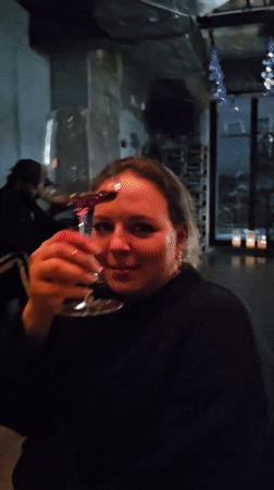 Couple spotted at Moscow bar with Russian wine signage