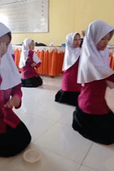 Young girls perform traditional dance in Keudekrueng, Indonesia