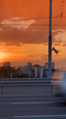 Fiery sunset documented across Novosibirsk bridges and highways