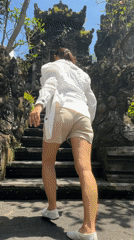 Tourist documents Balinese architecture at Kedewatan hotel