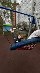 Urban playground visited by multiple people during midday