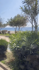 Sunny day captured along seaside walkway in Alanya, Turkey