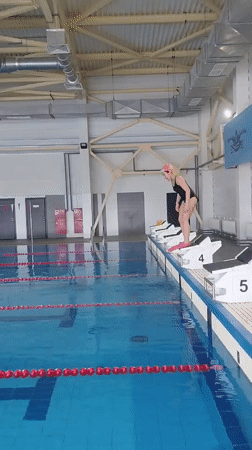 Women swim, dive and pose at Yakutsk pool facility