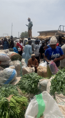 Routine market activity documented in Jos, Nigeria marketplace