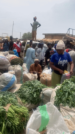 Routine market activity documented in Jos, Nigeria marketplace