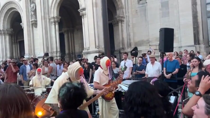 Live music outside a Parisian church on Fête de la Musique