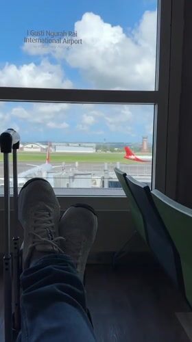 Early morning scenes captured at Bali airport and Ungasan statue