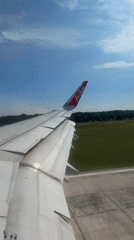 Air Asia plane observed taxiing at Malaysian airport