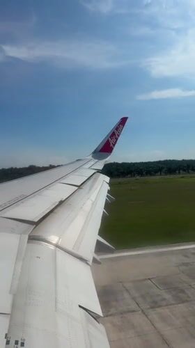 Air Asia plane observed taxiing at Malaysian airport