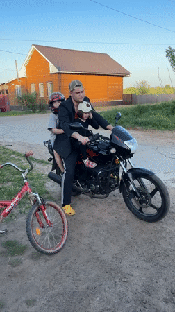 Family activities captured in rural Russian village afternoon