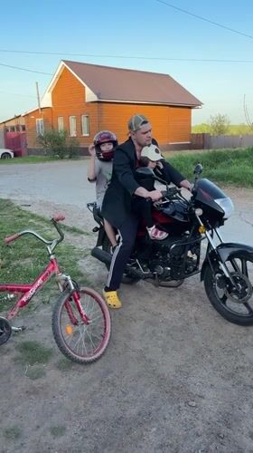 Family activities captured in rural Russian village afternoon