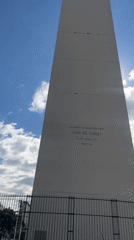 Buenos Aires Obelisk filmed on sunny Sunday afternoon