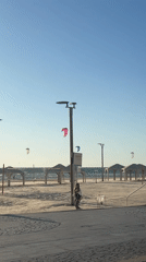 Tel Aviv beachgoers enjoy sunny afternoon with kitesurfing activities