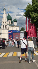 Community gathers for outdoor hockey viewing in Rusanovo