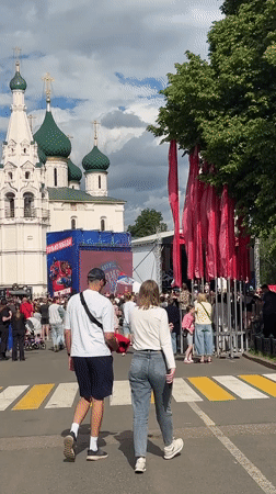 Community gathers for outdoor hockey viewing in Rusanovo