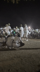 Uniformed group performs synchronized dance in Maiduguri dirt field