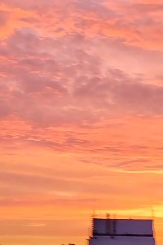Colorful twilight sky over Yashkino rooftops