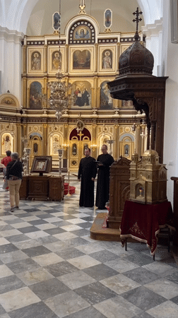 Tourist documents walking tour through historic Kotor, Montenegro