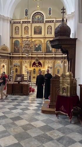 Tourist documents walking tour through historic Kotor, Montenegro