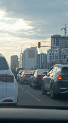 Driver documents routine journey through Astana streets and traffic
