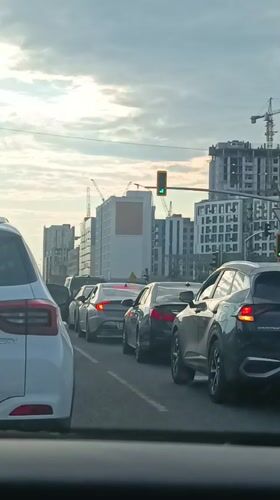 Driver documents routine journey through Astana streets and traffic
