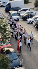 Marching band fills Valencia street with brass and percussion