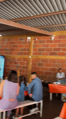 Restaurant interior with religious altar documented in Tepeji de Ocampo