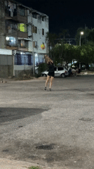 Two people spotted on nighttime street in Tinaquillo, Venezuela