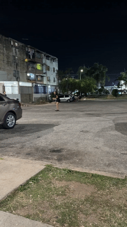 Two people spotted on nighttime street in Tinaquillo, Venezuela