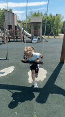 Playground session at a rubber-surfaced park in Gornye Kljuchi